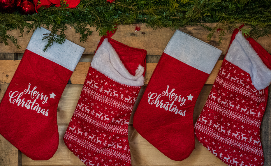 Red and white Christmas stockings with festive patterns